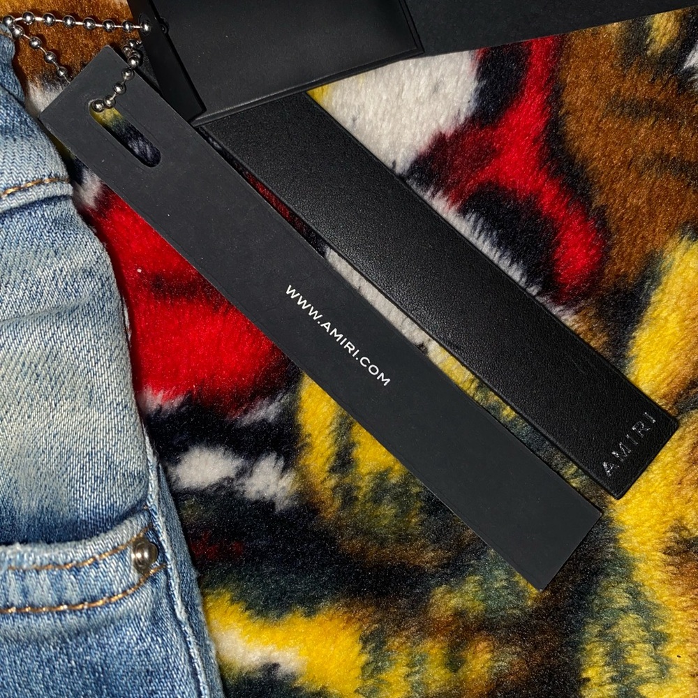 AMIRI Black Leather Label on Denim